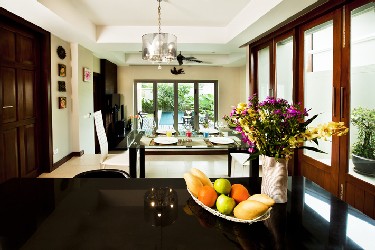 Living, dining and Kitchen Area with Garden and Pool View